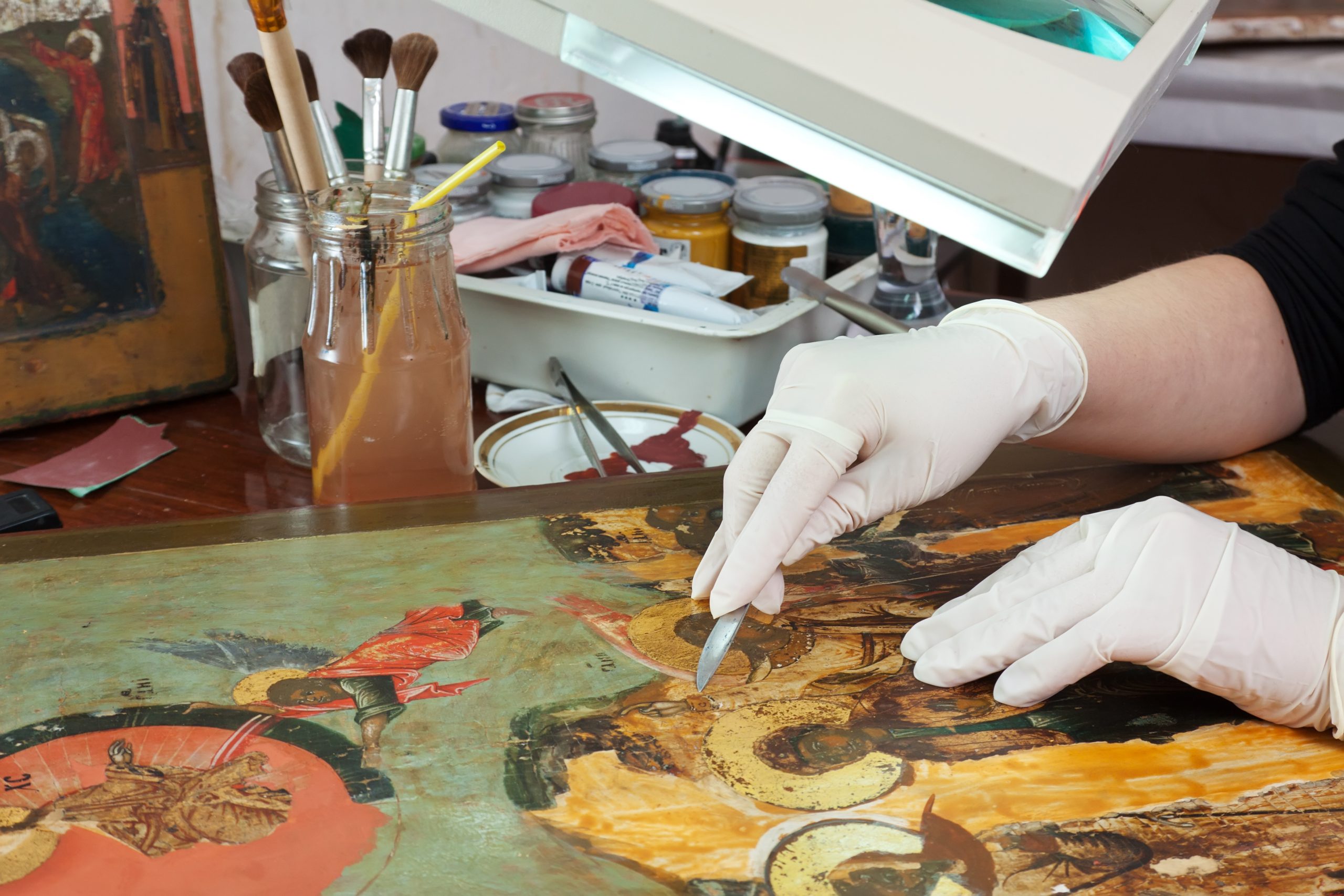 restoration of old icons in workshop