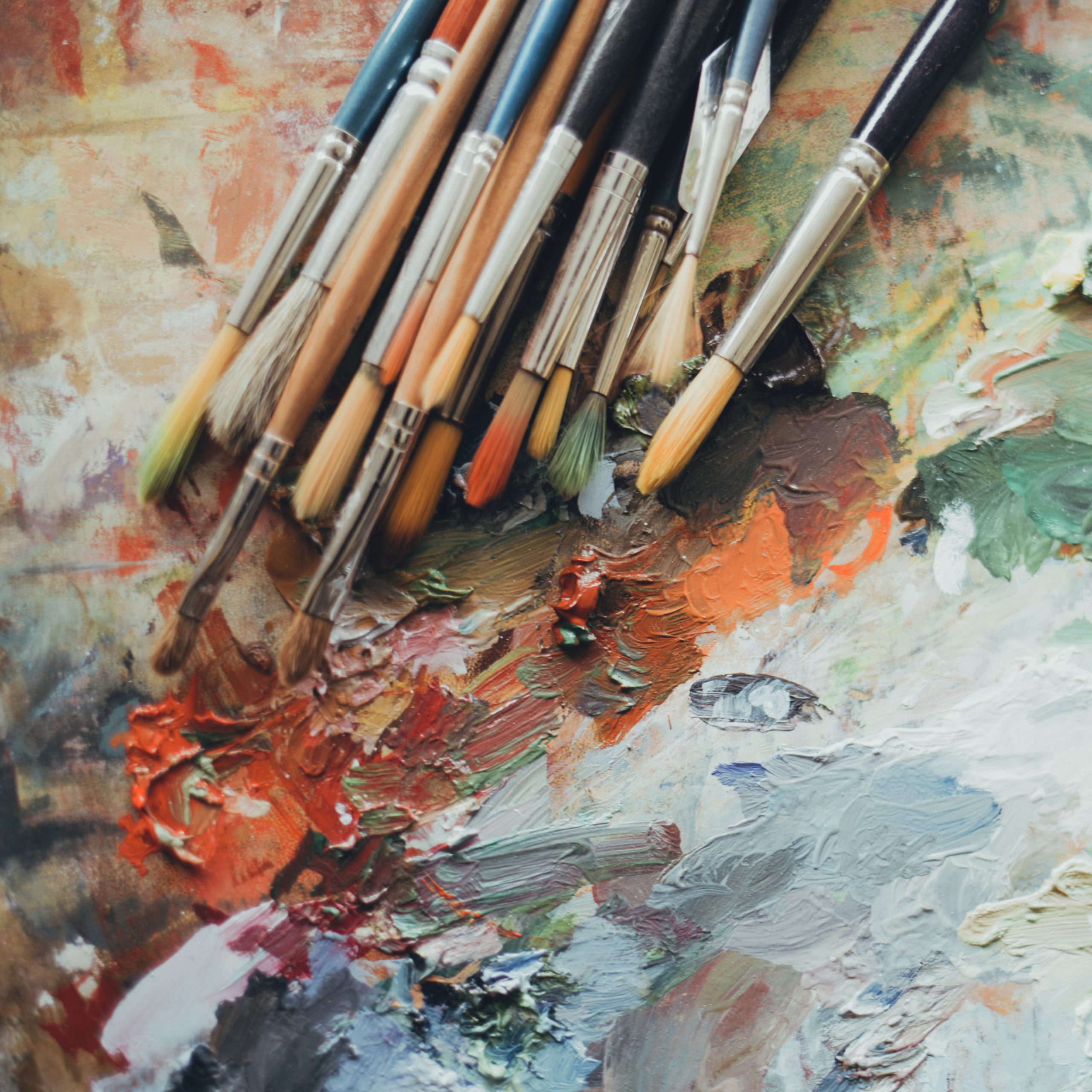 Colorful artist brushes and paint.