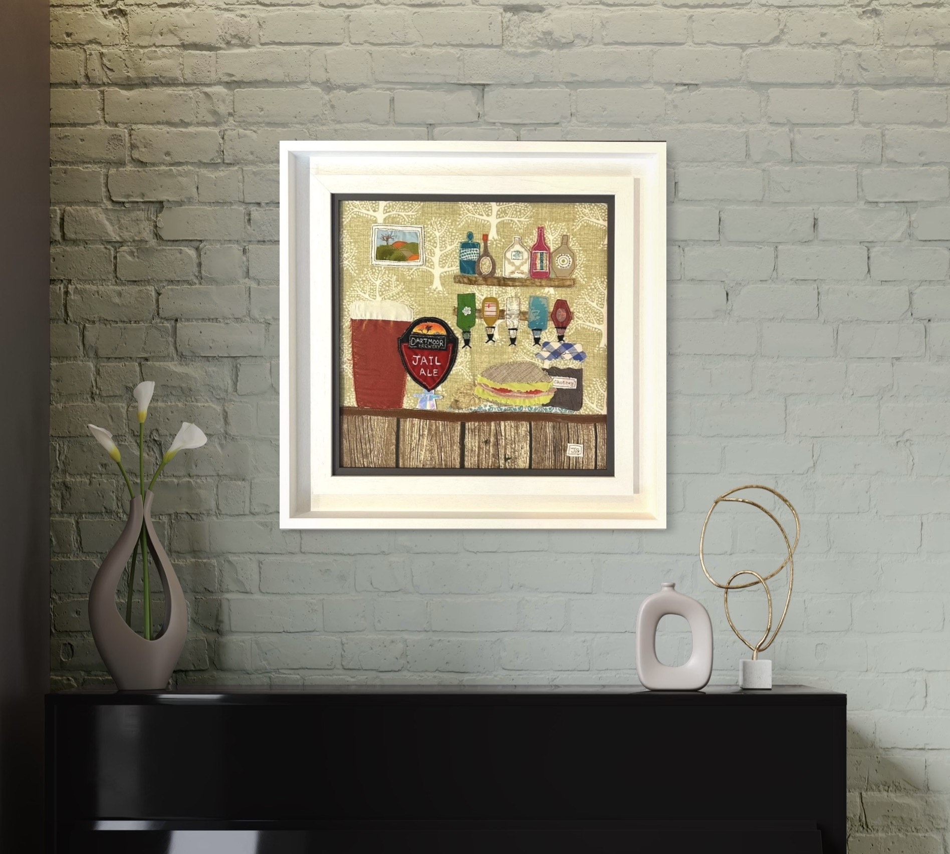 Framed textile art of a pint by Jackie gale, available through Wildwood Art Gallery